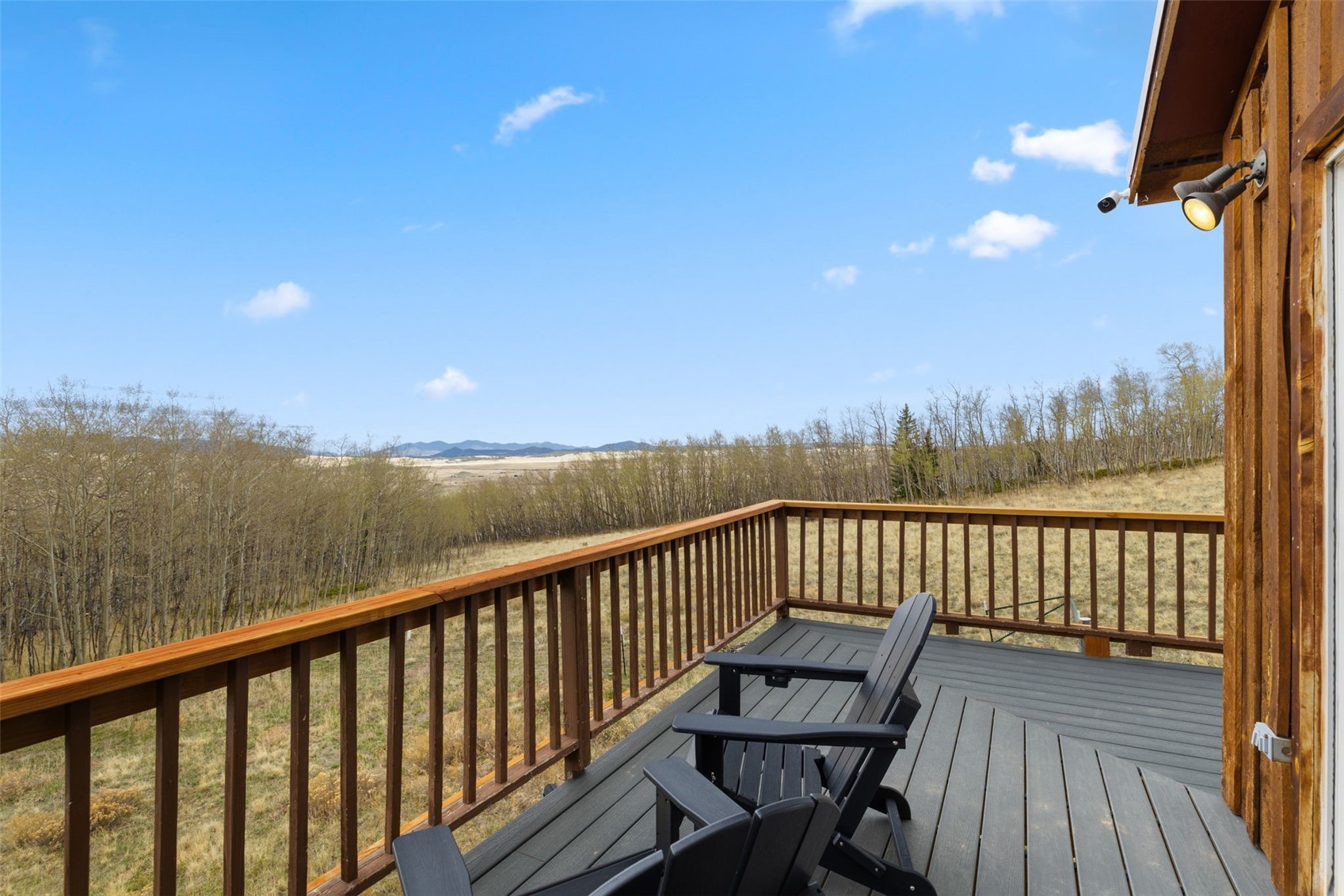 2349 Michigan Hill Road Jefferson, CO 80456 - Photo 32 of 33 a view of a balcony with wooden floor and fence