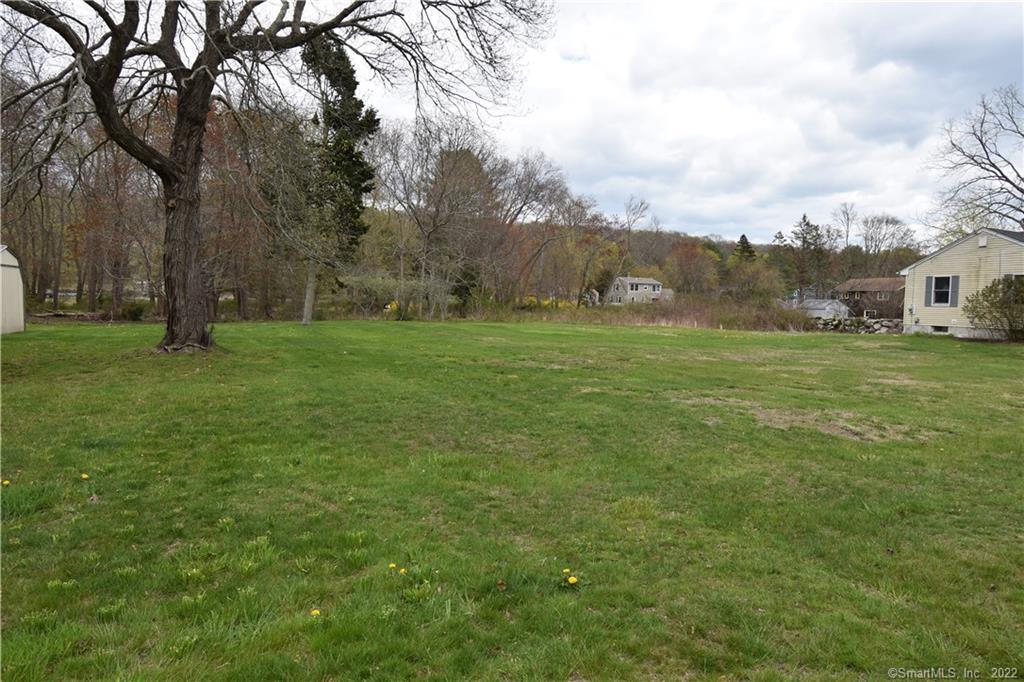 215 Pequotsepos Road Stonington, CT 06355 - Photo 3 of 5 a view of an outdoor space and yard