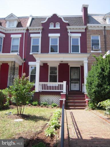 1346 Spring Road Northwest Washington, DC 20010 - Photo 1 of 30 a front view of a building