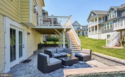 2301 Harmsworth Drive Dumfries, VA 22026 - Photo 14 of 18 a view of a patio with couches chairs and a yard