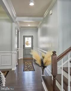 2301 Harmsworth Drive Dumfries, VA 22026 - Photo 2 of 18 a view of entryway with wooden floor