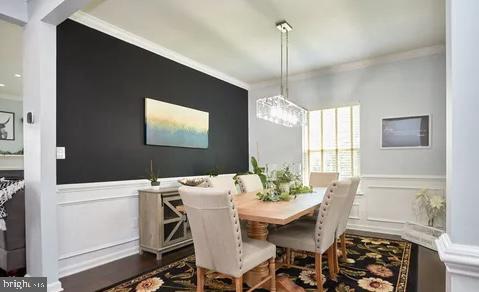 2301 Harmsworth Drive Dumfries, VA 22026 - Photo 3 of 18 a view of a dining room with furniture window and wooden floor