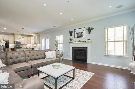 2301 Harmsworth Drive Dumfries, VA 22026 - Photo 4 of 18 a living room with furniture and a fireplace