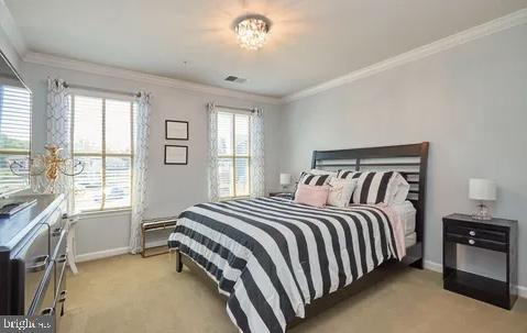 2301 Harmsworth Drive Dumfries, VA 22026 - Photo 9 of 18 a bedroom with a bed and a window