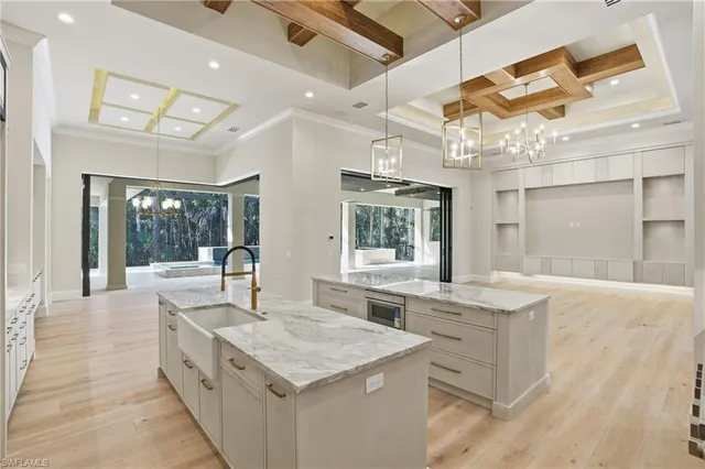 a view of a patio with a table and chairs