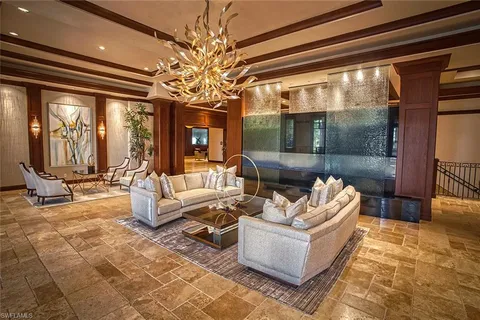 a group of people sitting in living room