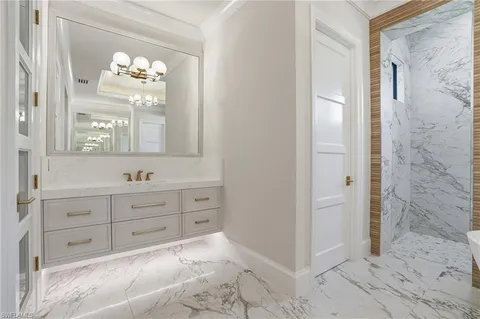 a bathroom with a bathtub and shower