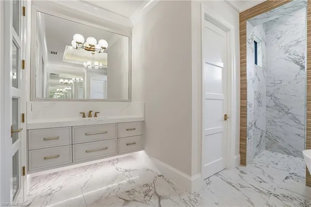 a bathroom with a bathtub and shower