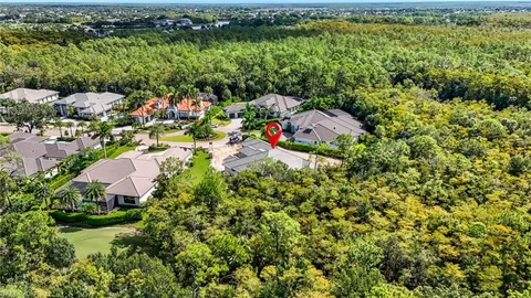 a view of a lake with a house