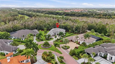 an aerial view of lake and city