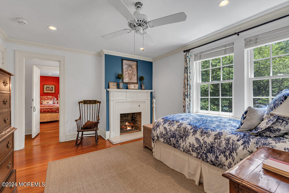 16 Buttonwood Lane Rumson, NJ 07760 - Photo 42 of 48 a living room with furniture and a fireplace