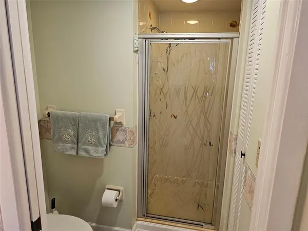 a view of a hallway with washer and dryer