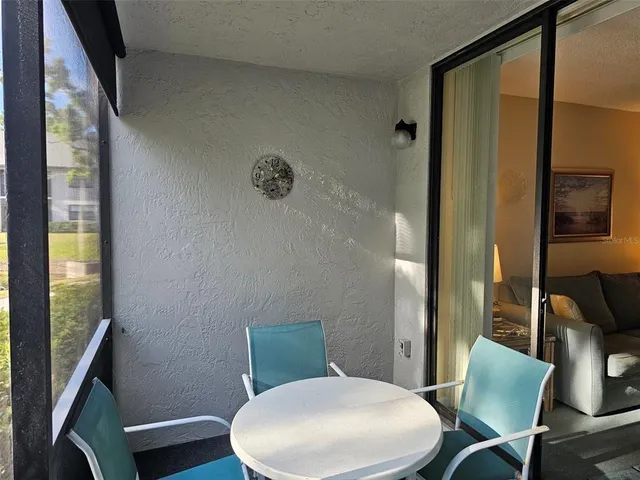 a view of swimming pool from a balcony