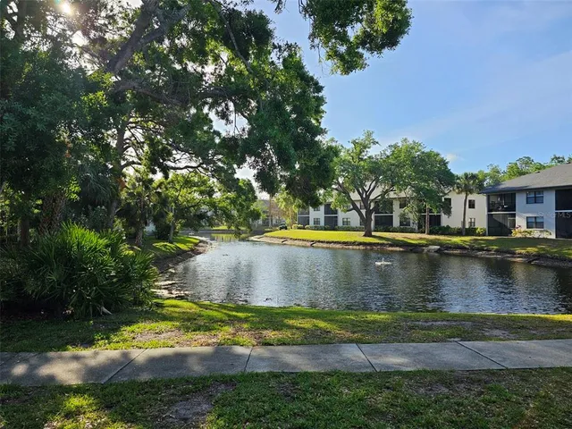 a front view of a house with swimming pool