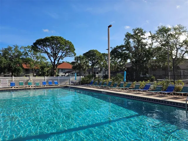 a view of outdoor space with a garden and sitting area