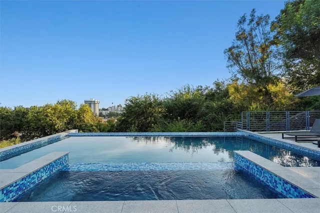 a view of a lake with trees