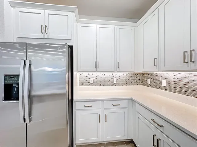 a bathroom with a stove and a microwave