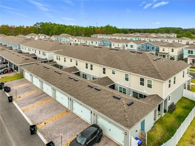 a view of a city with an ocean view