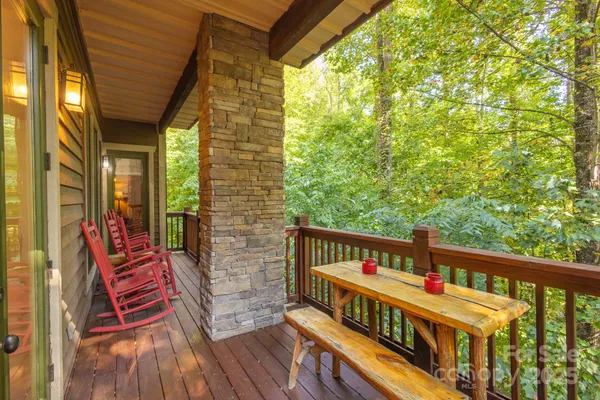 a view of a balcony with chairs
