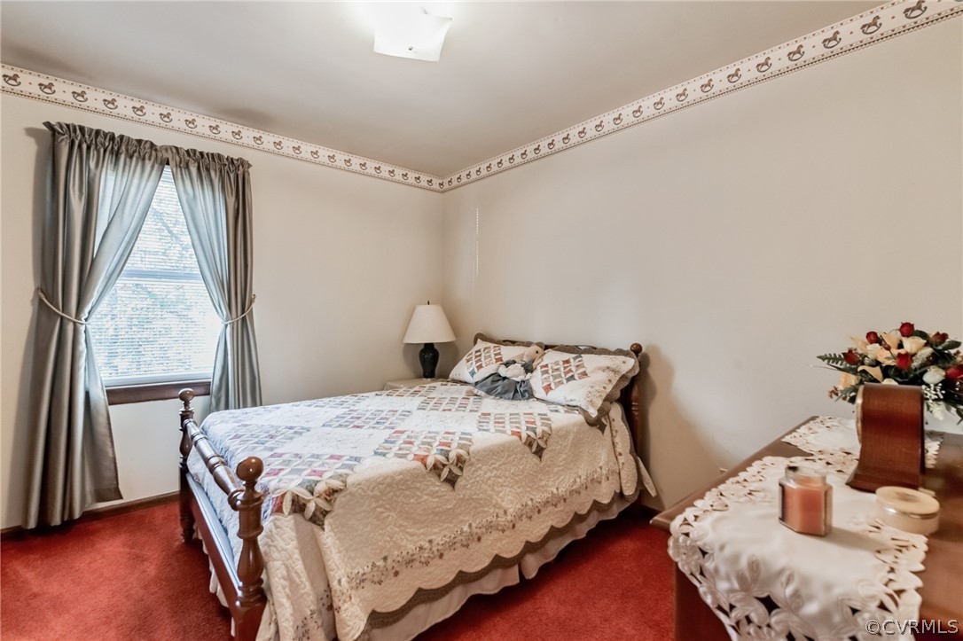 10411 Ambridge Road Chesterfield, VA 23832 - Photo 22 of 33 a bedroom with a bed and large windows