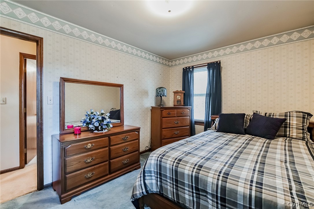 10411 Ambridge Road Chesterfield, VA 23832 - Photo 27 of 33 a bedroom with a bed and a dresser