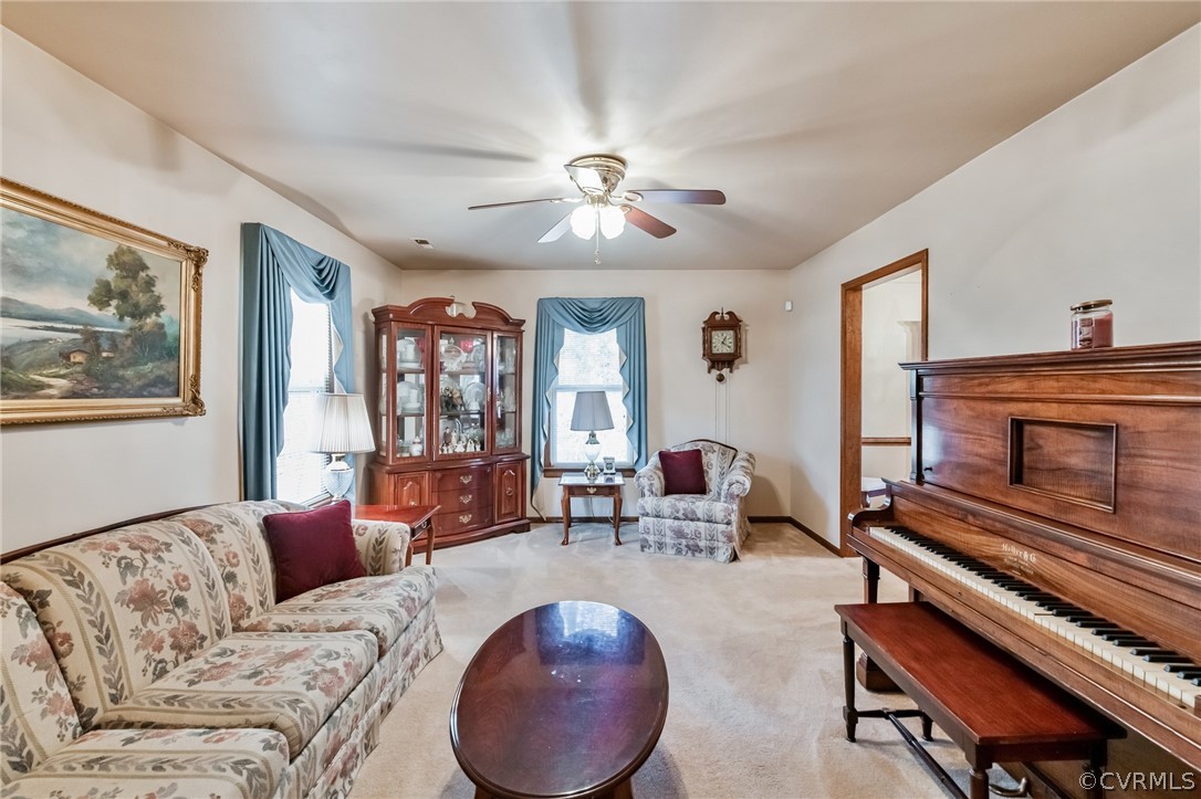 10411 Ambridge Road Chesterfield, VA 23832 - Photo 5 of 33 a living room with furniture and a fireplace