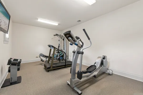 a view of a room with gym equipment