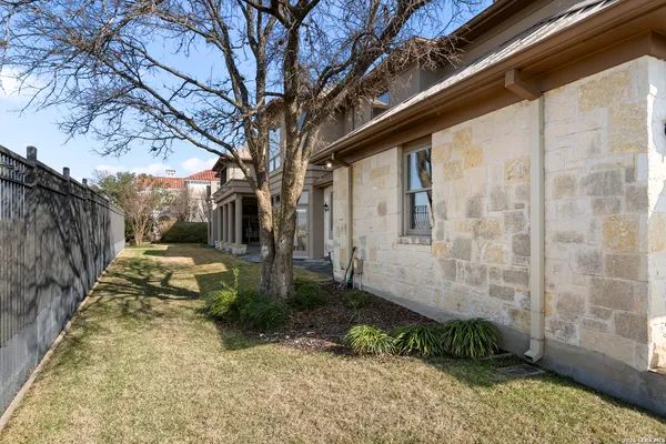 a view of a back yard of the house