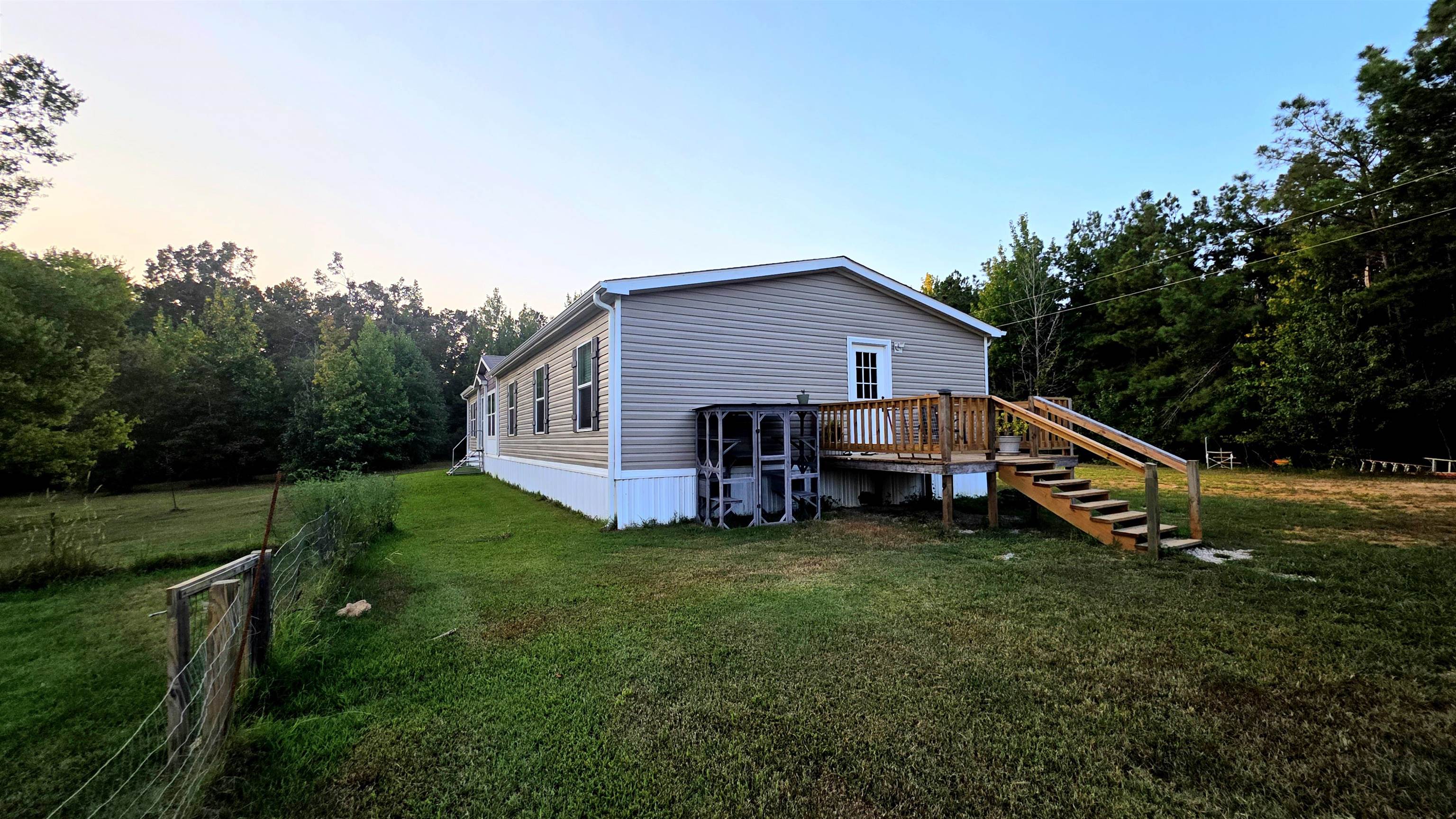 350 George Lane Michie, TN 38357 - Photo 16 of 22 Wood deck with natural finish and stairs