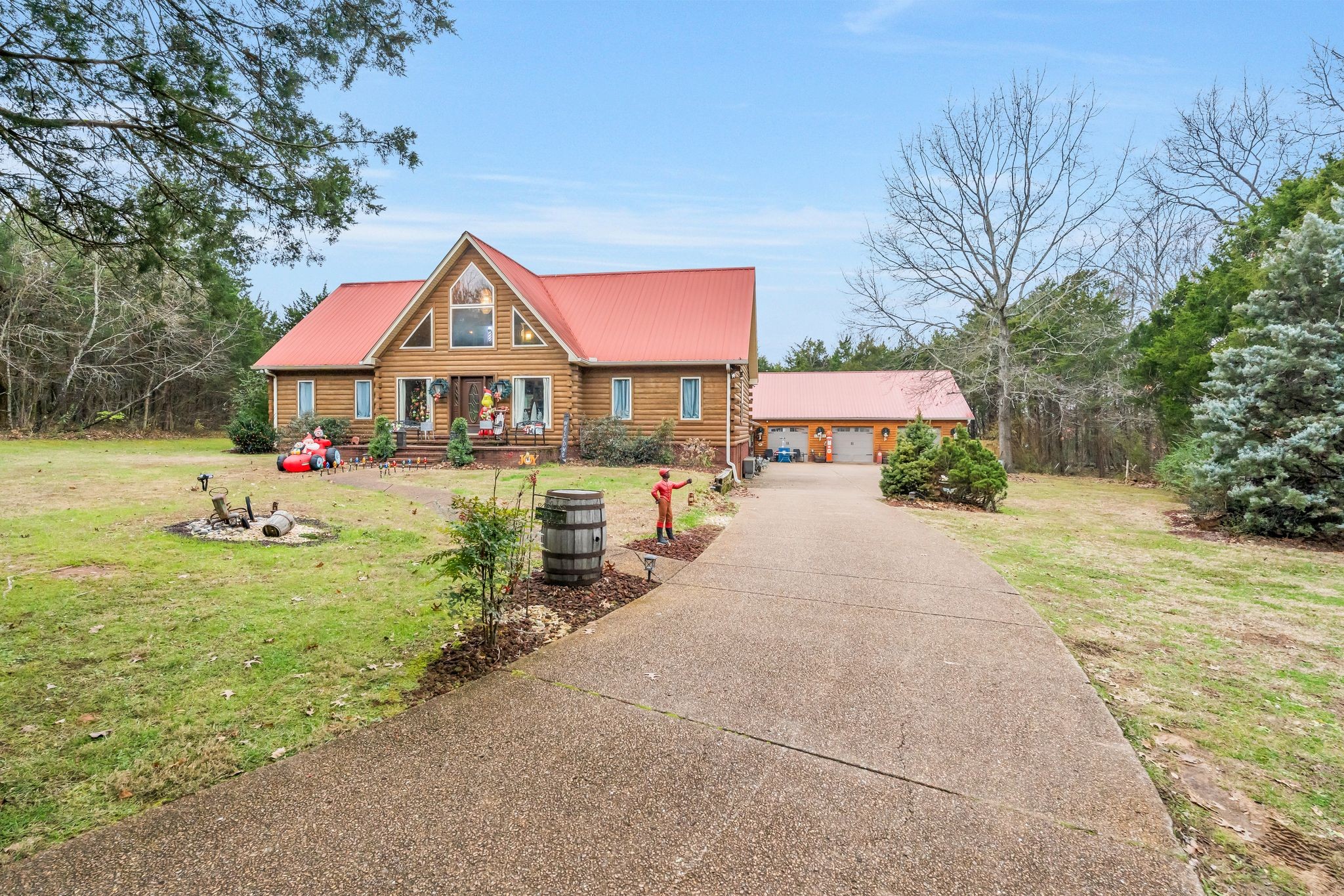 10955 Old Lebanon Road Murfreesboro, TN 37129 - Photo 4 of 100 a front view of a house with a yard table and chairs