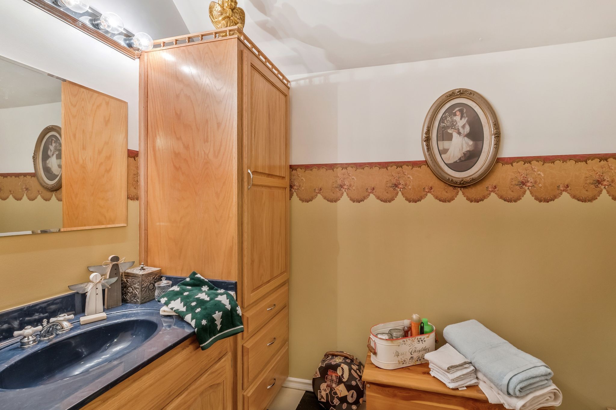 10955 Old Lebanon Road Murfreesboro, TN 37129 - Photo 48 of 100 a bathroom with a granite countertop sink and a mirror