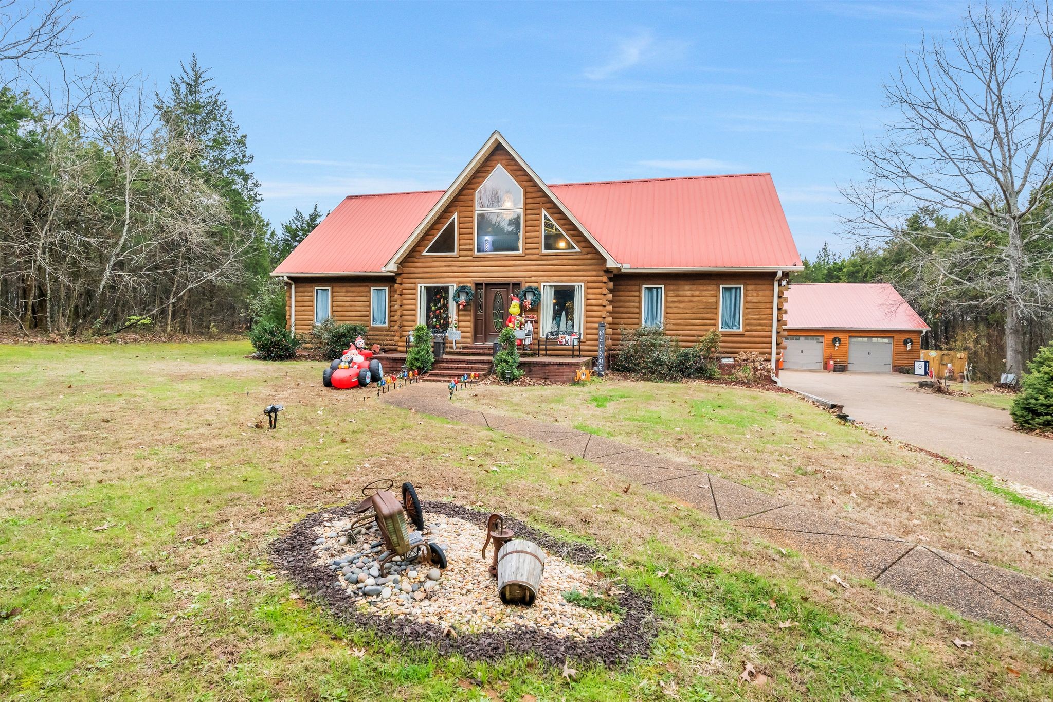 10955 Old Lebanon Road Murfreesboro, TN 37129 - Photo 6 of 100 a front view of a house with a yard