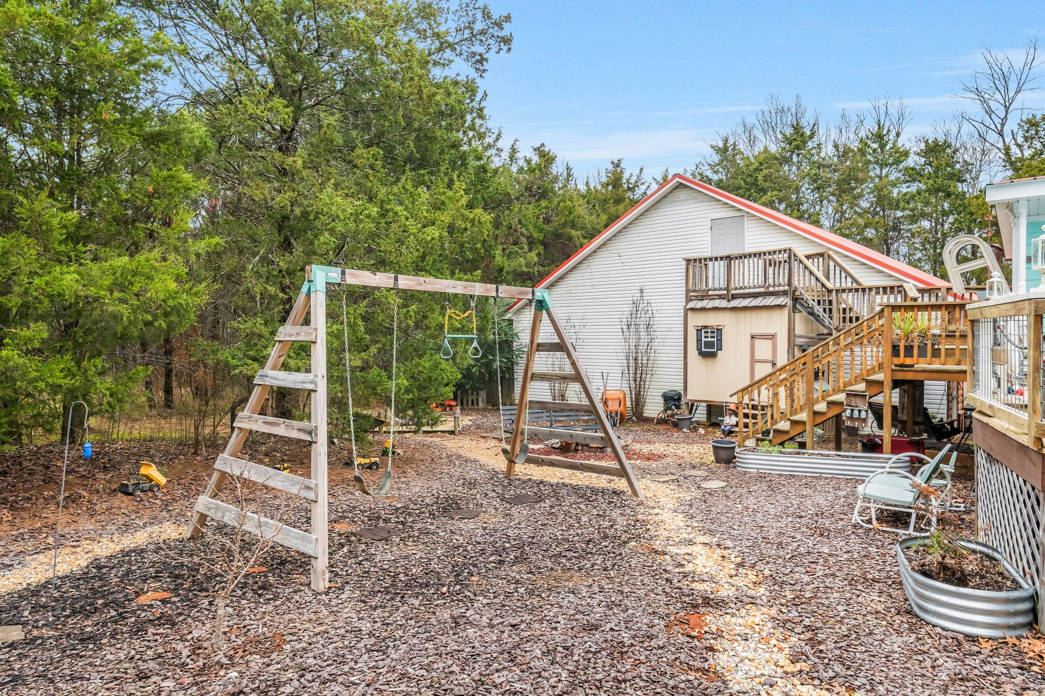 10955 Old Lebanon Road Murfreesboro, TN 37129 - Photo 73 of 100 a view of a house with a yard and wooden deck