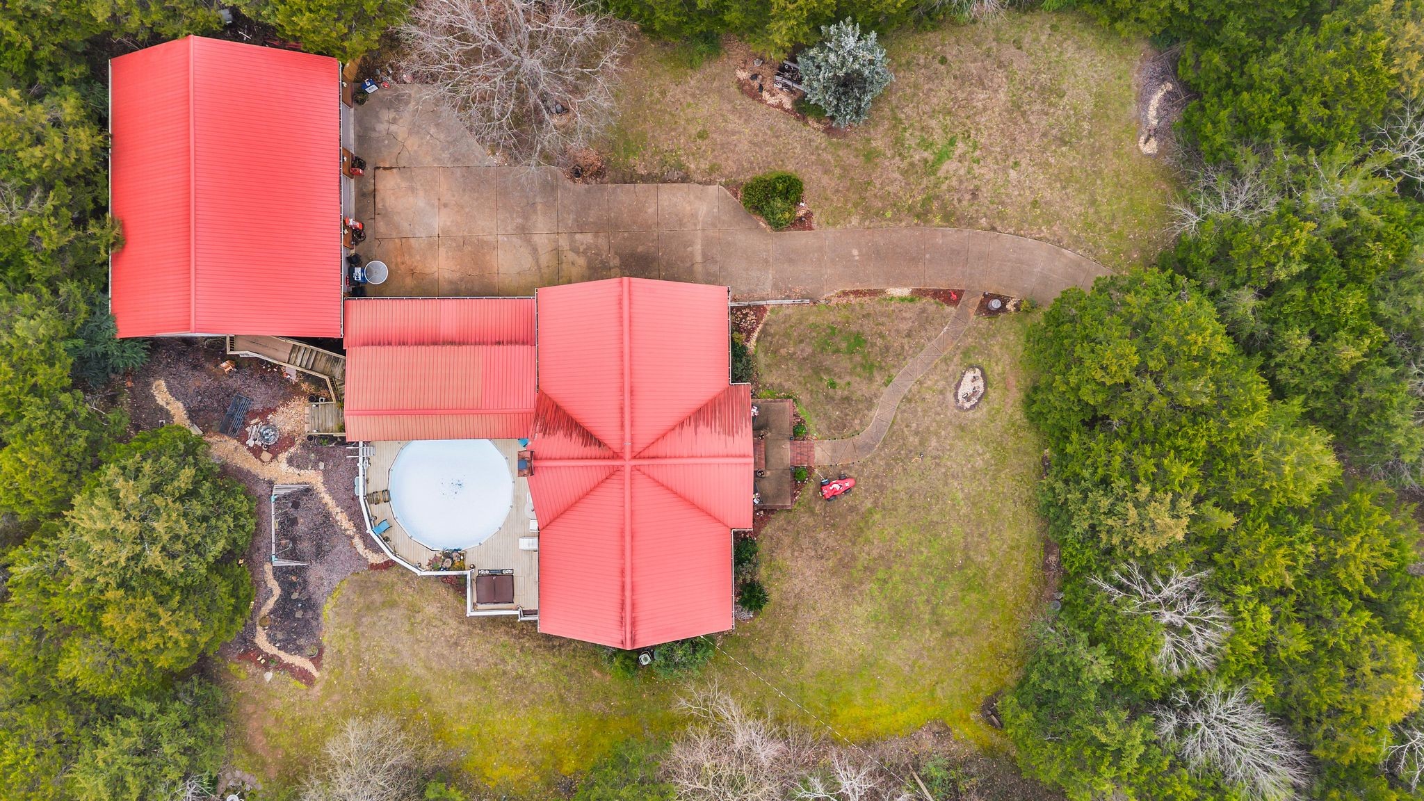 10955 Old Lebanon Road Murfreesboro, TN 37129 - Photo 99 of 100 an aerial view of a house with swimming pool and large trees