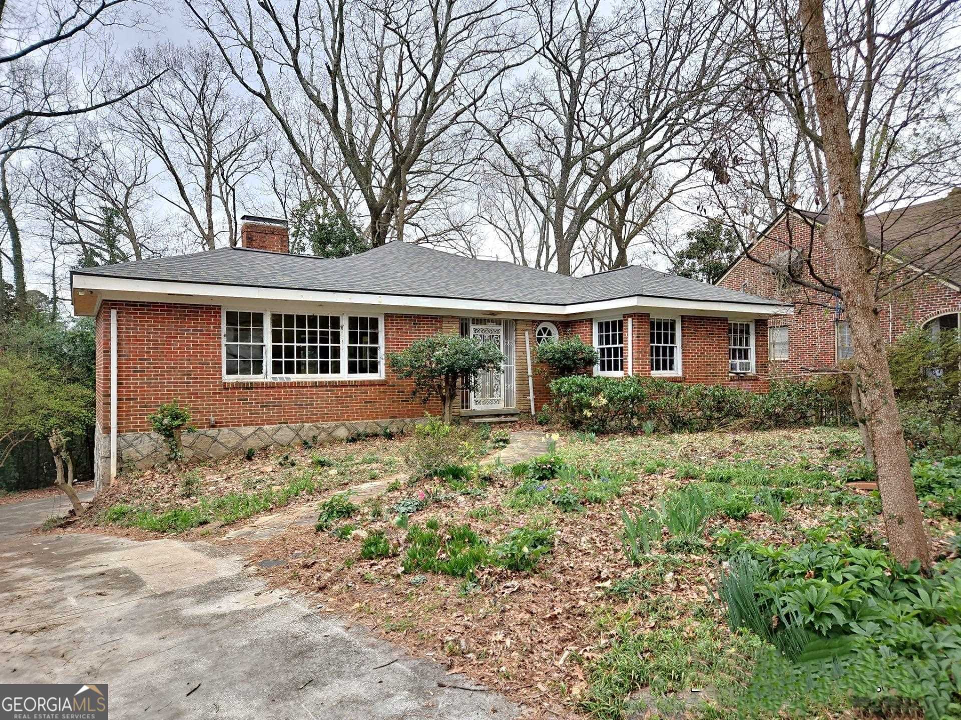 140 Pinecrest Avenue Decatur, GA 30030 - Photo 1 of 1 front view of a house with a yard