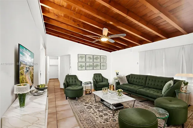 a room that has a bed and a cabinets