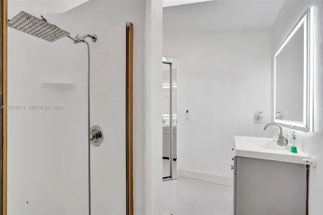 a white refrigerator freezer sitting inside of a kitchen