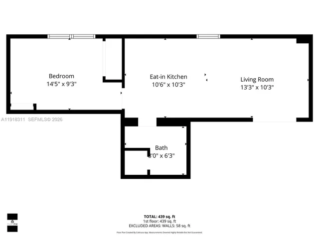 a bedroom with bed and a flat screen tv