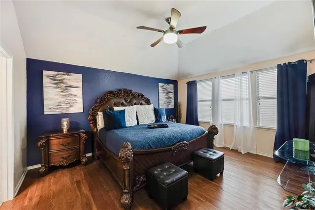 a bed room with furniture and a window