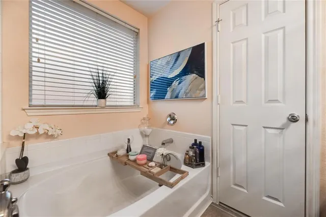 a bathroom with a sink and a bathtub