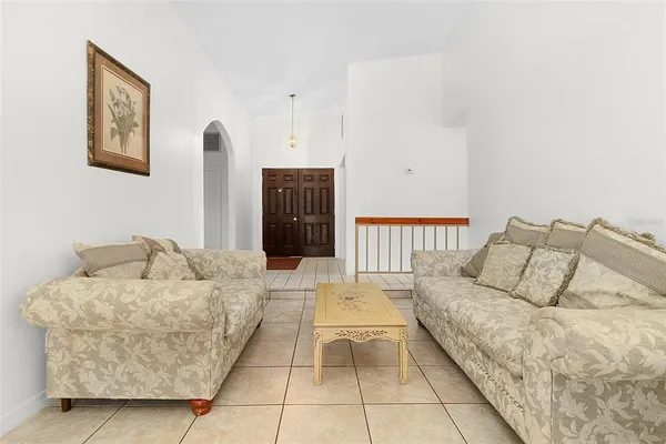 a living room with furniture and a couch