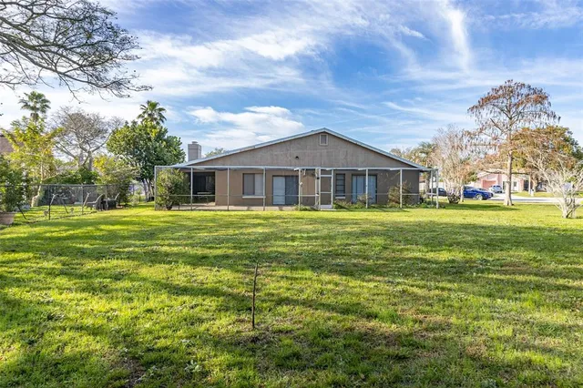 a front view of house with garden
