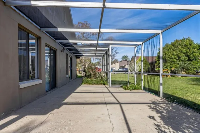 a view of a porch with hardwood