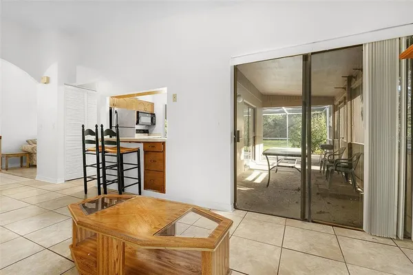 a room with table and chairs