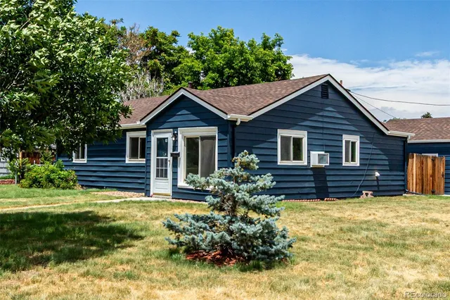 a house view with a garden space