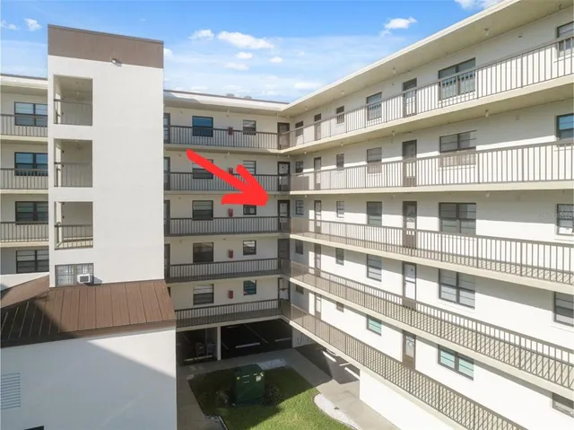 a kitchen with a refrigerator stove and sink