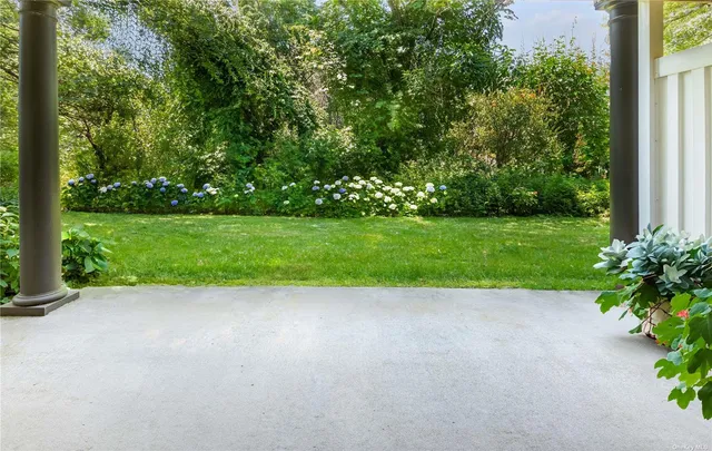 a view of a garden with an outdoor space