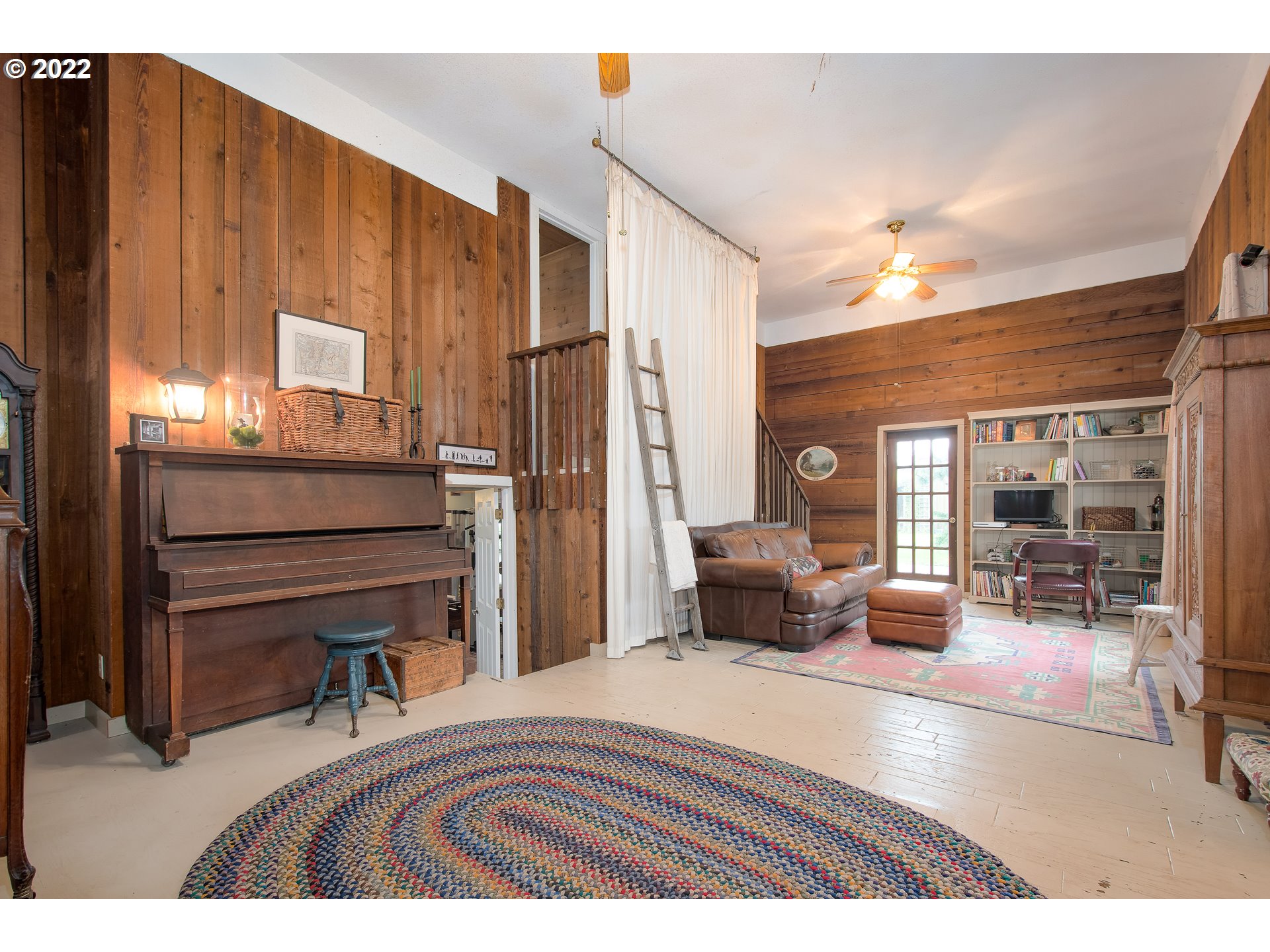 181 Marble Road Washougal, WA 98671 - Photo 11 of 32 a bedroom with furniture and a fireplace