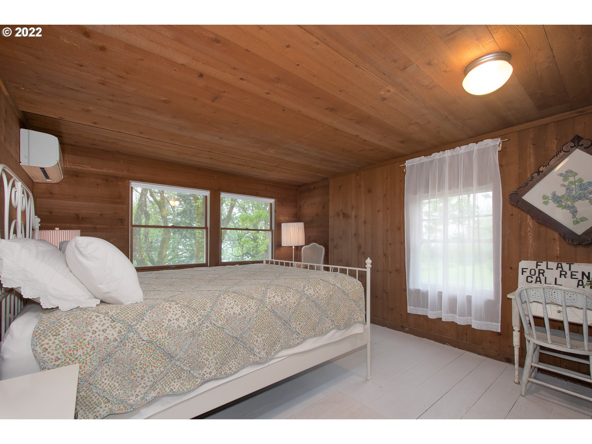 181 Marble Road Washougal, WA 98671 - Photo 13 of 32 a bedroom with a bed and a large window