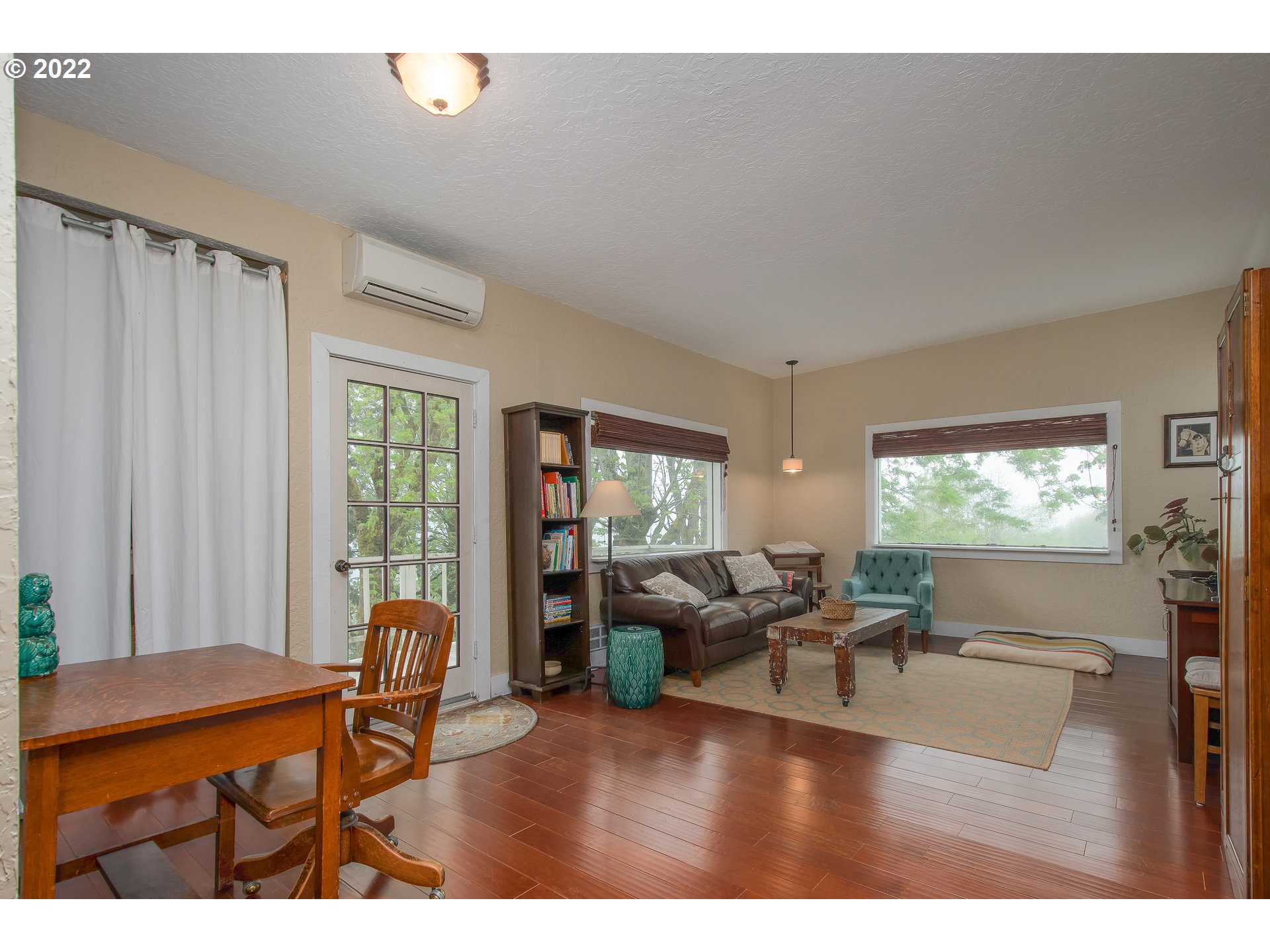 181 Marble Road Washougal, WA 98671 - Photo 17 of 32 a living room with furniture and a flat screen tv